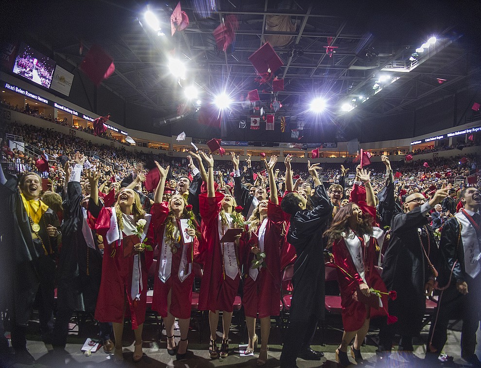 Graduates toss their mortar boards during the 2018 Bradshaw Mountain High School Commencement Ceremony at the Prescott Valley Event Center Thursday, May 24, 2018. (Les Stukenberg/Courier)