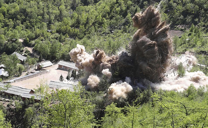 In this Thursday, May 24, 2018 photo, command post facilities of North Korea's nuclear test site are blown up in Punggye-ri, North Korea. (Korea Pool/Yonhap via AP)

