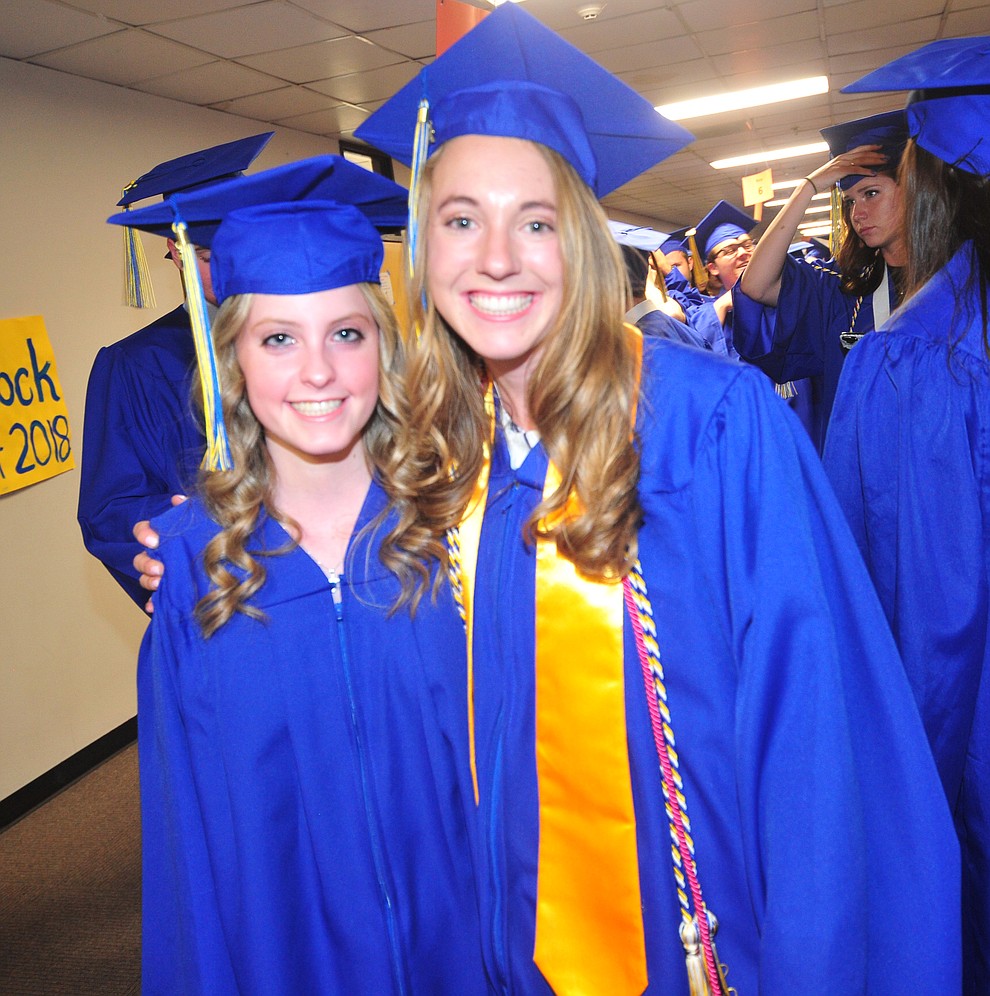 Gabriella Baumgartner and McKenzie Roberts before the 2018 Prescott High School Commencement Ceremony at the school Friday, May 25, 2018. (Les Stukenberg/Courier)