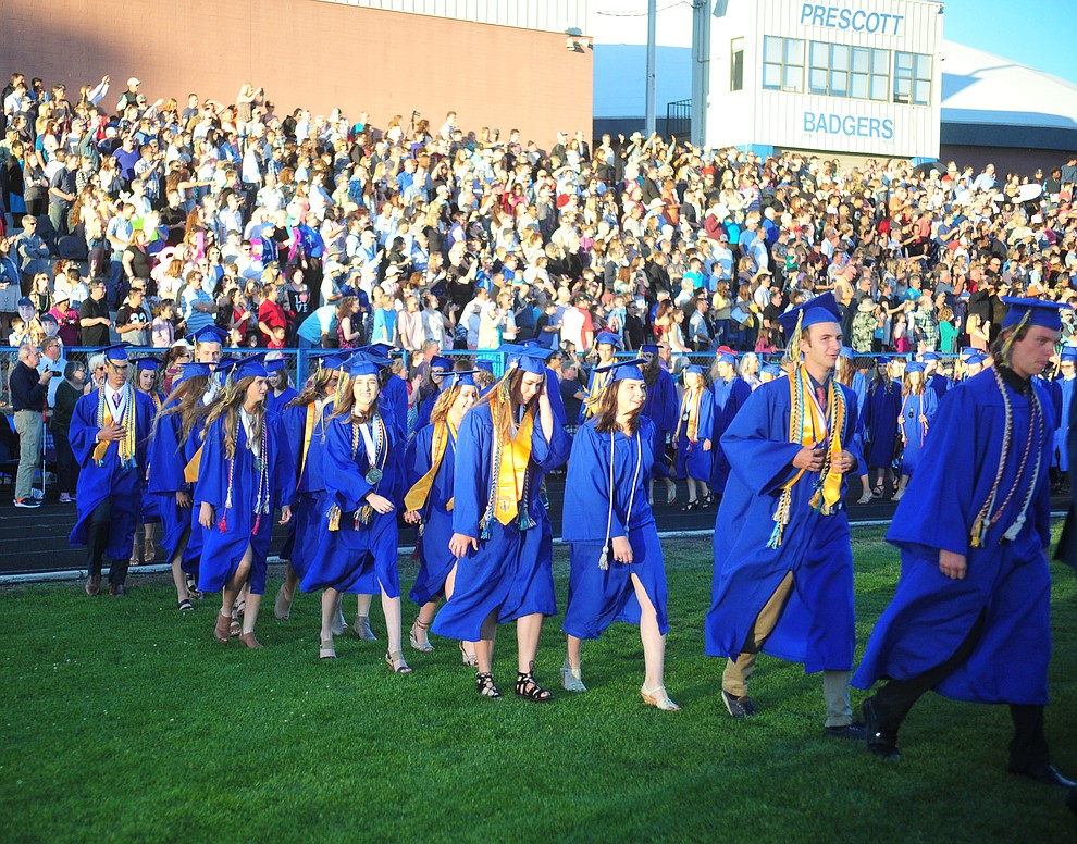 Students walk in the processional during the 2018 Prescott High School Commencement Ceremony at the school Friday, May 25, 2018. (Les Stukenberg/Courier)