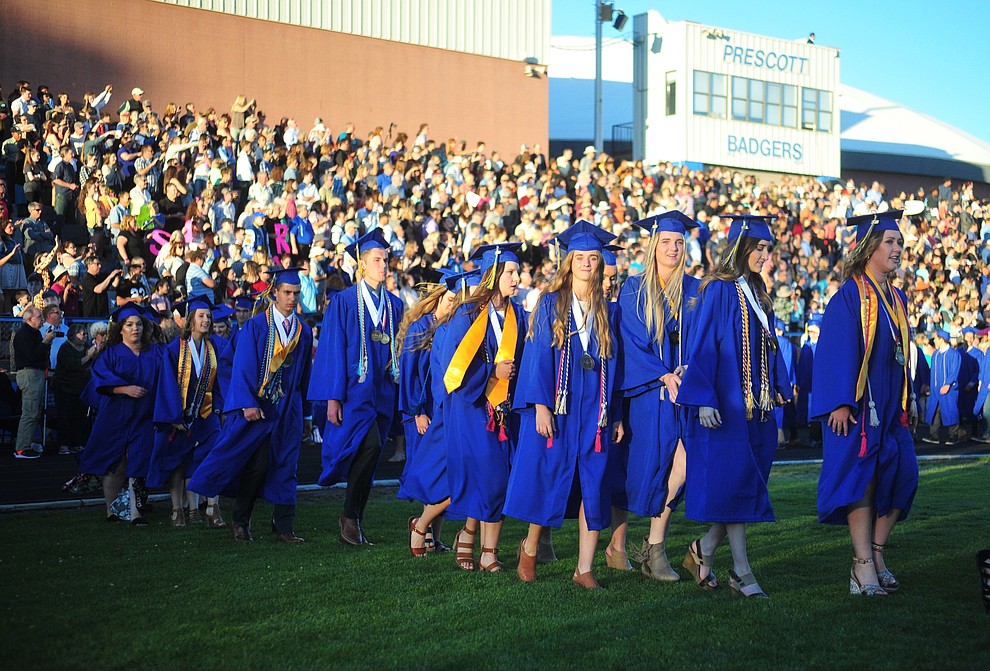 Students walk in the processional during the 2018 Prescott High School Commencement Ceremony at the school Friday, May 25, 2018. (Les Stukenberg/Courier)