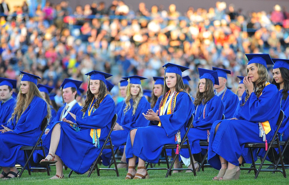 Students listen to a speaker during the 2018 Prescott High School Commencement Ceremony at the school Friday, May 25, 2018. (Les Stukenberg/Courier)