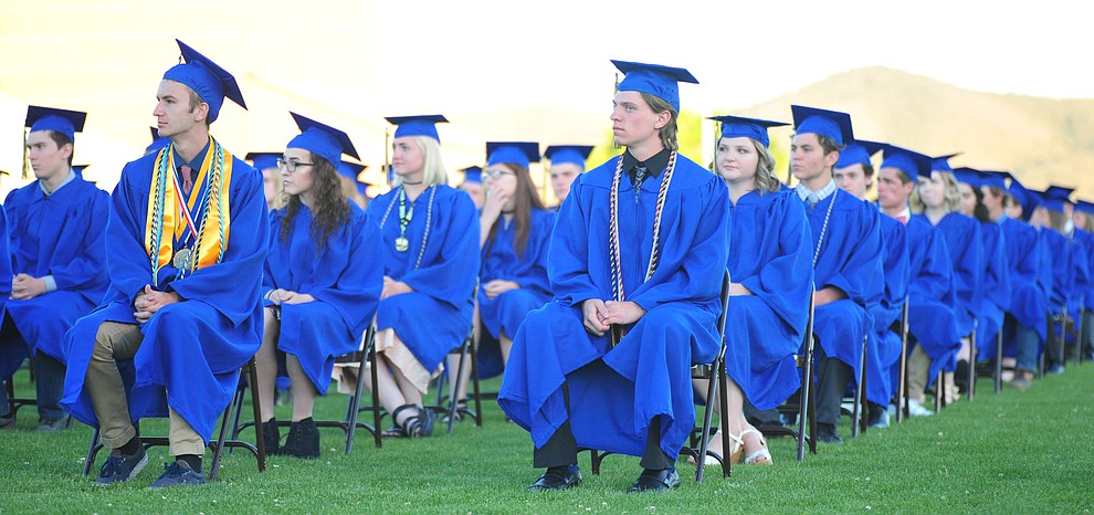 Students listen to a speaker during the 2018 Prescott High School Commencement Ceremony at the school Friday, May 25, 2018. (Les Stukenberg/Courier)