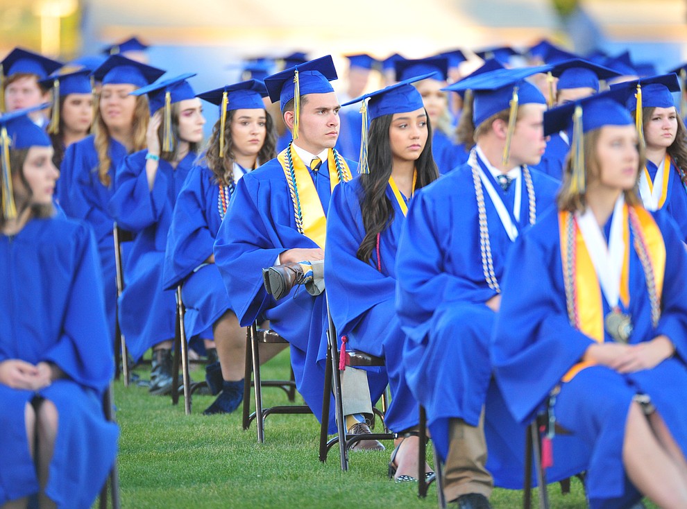 Students listen to a speaker during the 2018 Prescott High School Commencement Ceremony at the school Friday, May 25, 2018. (Les Stukenberg/Courier)