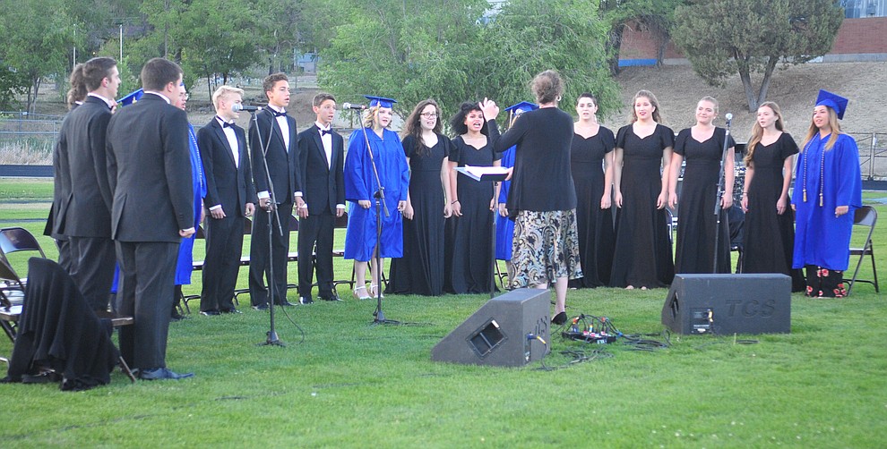 The Chorale Union sings "Go the Distance" during the 2018 Prescott High School Commencement Ceremony at the school Friday, May 25, 2018. (Les Stukenberg/Courier)