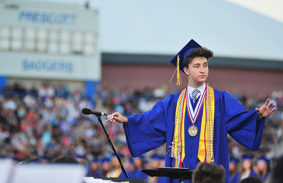 Senior Wesley Bradstreet conducts the concert band during the 2018 Prescott High School Commencement Ceremony at the school Friday, May 25, 2018. (Les Stukenberg/Courier)