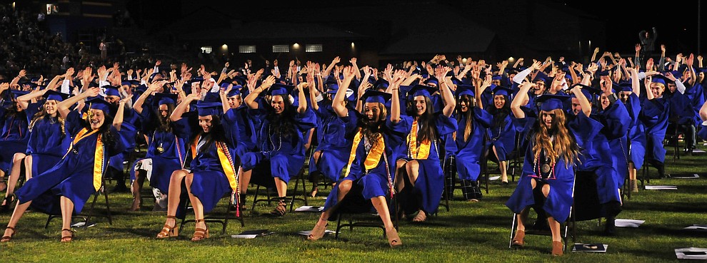 The seniors do their final rollercoaster before graduating during the 2018 Prescott High School Commencement Ceremony at the school Friday, May 25, 2018. (Les Stukenberg/Courier)