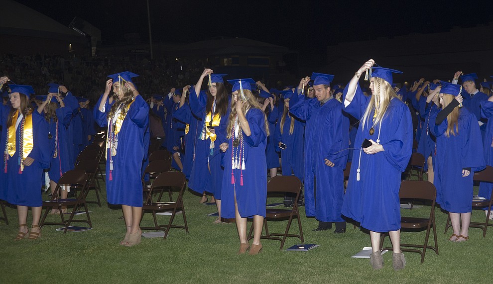 Graduates move thier tassles during the 2018 Prescott High School Commencement Ceremony at the school Friday, May 25, 2018. (Les Stukenberg/Courier)