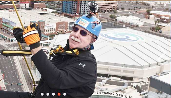 Charles Ryan, Arizona Department of Corrections director, is pictured rapelling down the Phoenix CityScape Saturday, Dec. 9, 2017, as part of a fundraising event for Special Olympics Arizona. In May of 2018, he lost an appeal of a court order that threatened to hold him in civil contempt of court over his neglect of promised improvements in healthcare for inmates. (Arizona Dept. of Corrections/Courtesy)