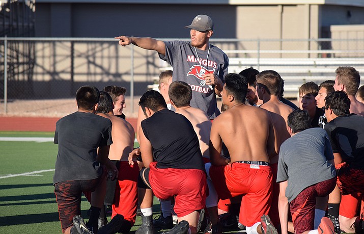 Mingus head football coach Robert Ortiz addresses the team during his first practice in charge on Tuesday. (VVN/James Kelley)