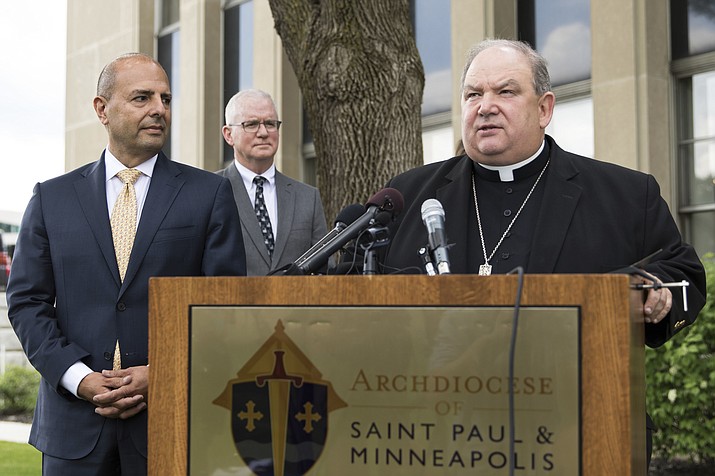 Archbishop Bernard Hebda speaks during a press conference regarding the settlement with the Archdiocese of St. Paul and Minneapolis outside the Archdiocese Offices in Saint Paul, Minn., Thursday, May 31, 2018. The Archdiocese of St. Paul and Minneapolis has agreed to a $210 million settlement with 450 victims of clergy sexual abuse as part of its plan for bankruptcy reorganization, making this the second-largest U.S. payout in the clergy abuse scandal. (Lacey Young/Minnesota Public Radio via AP)

