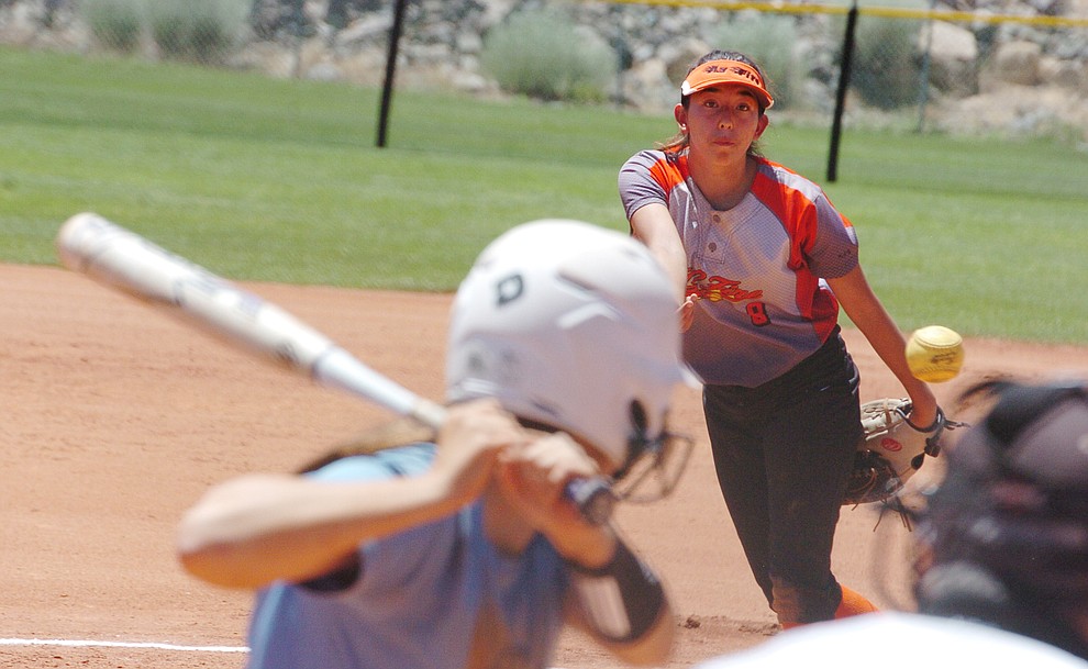 Prescott's Northern Fire's Shiya Romero delivers a pitch at the Schools Out for Summer NSA fastpitch girls softball tournament at Pioneer Park in Prescott Saturday, June 2, 2018. (Les Stukenberg/Courier)