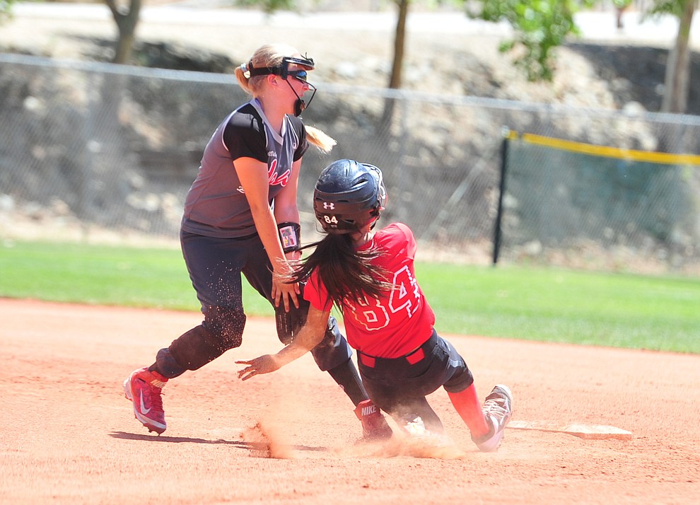 Verde Valley Heat Elite 14U's Emma Agronovitz tries to make a play at second base at the Schools Out for Summer NSA fastpitch girls softball tournament at Pioneer Park in Prescott Saturday, June 2, 2018. (Les Stukenberg/Courier)