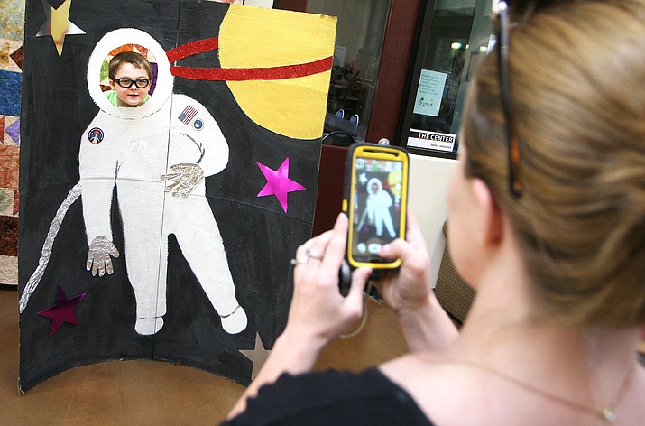 Camp Verde resident Cassie Strean photographs her son Austin as an astronaut last year at Camp Verde Community Library’s Summer Reading Program kickoff. (Photo by Bill Helm)