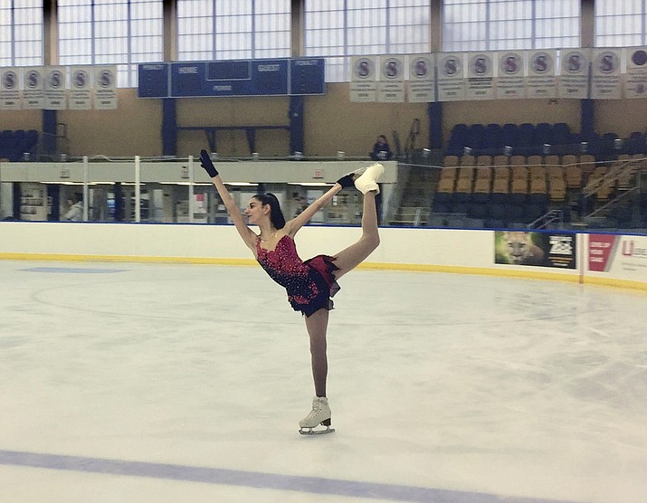 In this June 3, 2018, photo provided by Championship Figure Skating Camp, skater Isabella Melendez practices a spiral at Essex County Codey Arena in West Orange, N.J. Rosie Tovi has a better idea. The figure skating coach believes _ and she has many supporters throughout the ice world _ an emphasis on "happy and healthy" should take precedence over turning the sport into gymnastics in a rink. The longtime coach and choreographer calls it a holistic approach. "Holistic is a perfect word, because it is the whole," says Tovi, who will be launching her Championship Figure Skating Camp at the Essex County Codey Arena in West Orange on June 25. (Rosie Tovi/Championship Figure Skating Camp via AP)

