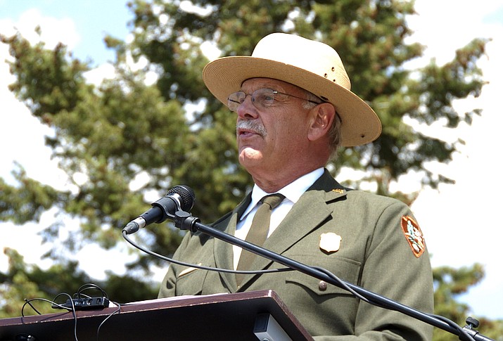 This August 17, 2017 file photo shows Yellowstone Superintendent Dan Wenk speaking at an event marking a conservation agreement for a former mining site just north of the park in Jardine, Mont. Wenk on Friday, June 1, 2018, announced he plans to retire next March. (AP Photo/Matthew Brown, File)

