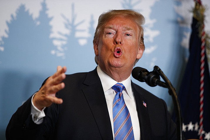 President Donald Trump speaks during a news conference at the G-7 summit, Saturday, June 9, 2018, in La Malbaie, Quebec, Canada. (AP Photo/Evan Vucci)