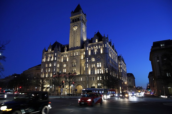 This Jan. 30, 2018, file photo shows the Trump International Hotel in Washington. President Donald Trump's hotel company did not break the law by doing business with other countries, a Justice Department lawyer told a federal judge Monday, June 11. The state of Maryland and the District Columbia have accused Trump of capitalizing on the presidency and causing harm to local businesses that compete with his Washington hotel. (AP Photo/Alex Brandon, File)

