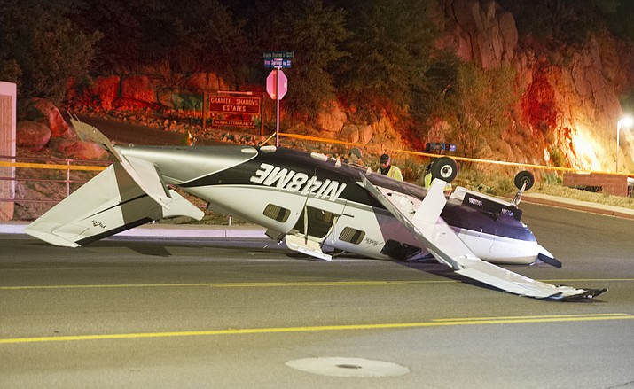 A Piper Malibu, six-seater aircraft crash landed in the 1500 block of Iron Springs Road in Prescott Tuesday, May 29, 2018, at about 9:12 p.m. The three people on board the aircraft escaped with minor injuries and were taken to Yavpai Regional Medical Center to be evaluated. (Les Stukenberg/Courier)