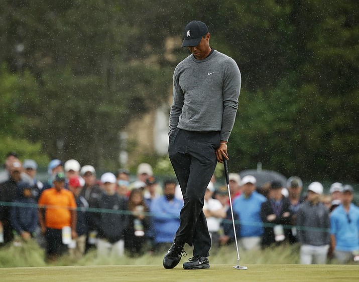 Tiger Woods waits to putt on the 15th green during the second round of the U.S. Open Golf Championship, Friday, June 15, 2018, in Southampton, N.Y. (Carolyn Kaster/AP)