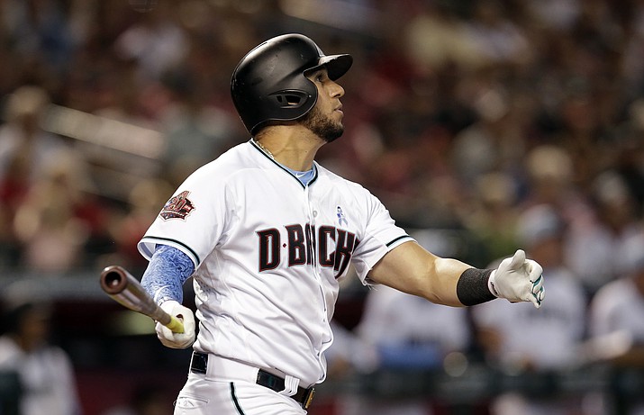 Arizona Diamondbacks David Peralta watches his RBI-double against the New York Mets in the fourth inning during a baseball game, Sunday, June 17, 2018, in Phoenix. (Rick Scuteri/AP Photo)