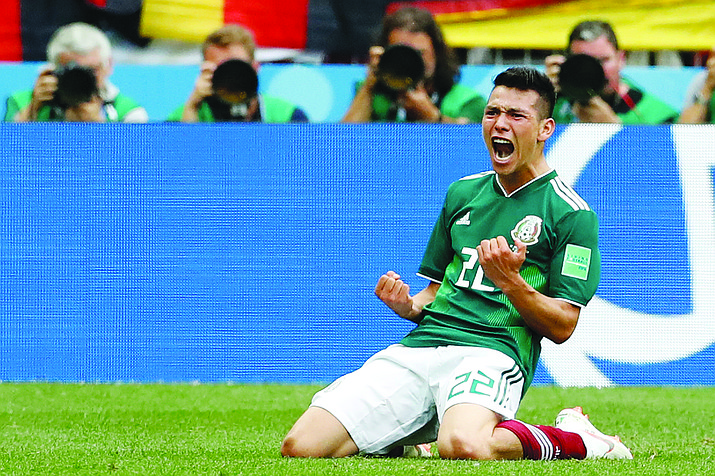 Mexico’s Hirving Lozano, celebrates scoring his side’s opening goal during the group F match between Germany and Mexico at the 2018 soccer World Cup in the Luzhniki Stadium in Moscow, Russia, Sunday, June 17, 2018. (Antonio Calanni/AP Photo)