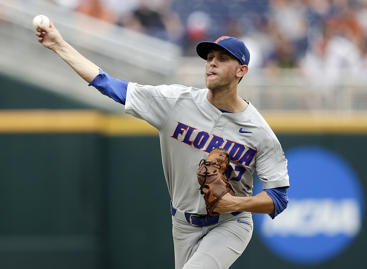 Florida pitcher Jackson Kowar (37) delivers against Texas in the fourth inning of an NCAA College World Series baseball elimination game in Omaha, Neb., Tuesday, June 19, 2018. (Nati Harnik/AP)