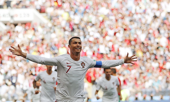 Portugal's Cristiano Ronaldo celebrates after scoring the opening goal during the group B match between Portugal and Morocco at the 2018 soccer World Cup in the Luzhniki Stadium in Moscow, Russia, Wednesday, June 20, 2018. (Francisco Seco/AP)