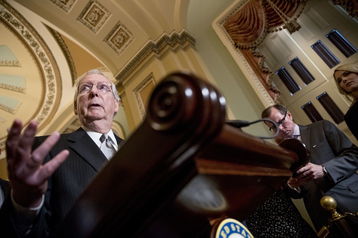 Senate Majority Leader Mitch McConnell of Ky., speaks with reporters following a closed door luncheon on Capitol Hill in Washington, Tuesday, June 26, 2018. (AP Photo/Andrew Harnik)


