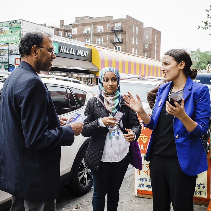 This May 6, 2018 photo provided by the Alexandria Ocasio-Cortez Campaign shows candidate Alexandria Ocasio-Cortez, right, during a Bengali community outreach in New York. Ocasio-Cortez, a 28-year-old political novice running on a low budget and an unabashedly liberal platform, upset longtime U.S. Rep. Joseph Crowley on Tuesday in the Democratic congressional primary in New York. (Corey Torpie/Courtesy Alexandria Ocasio-Cortez Campaign via AP)

