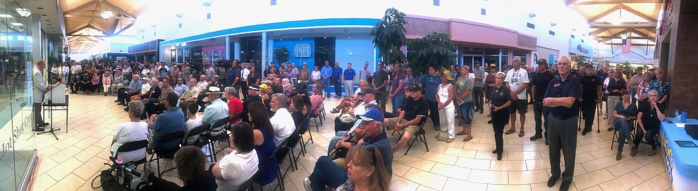 A large crowd is on hand as the Granite Mountain Interagency Hotshot Crew Learning and Tribute Center opens at the  Prescott Gateway Mall Friday, June 29, 2018.(Les Stukenberg/Courier)