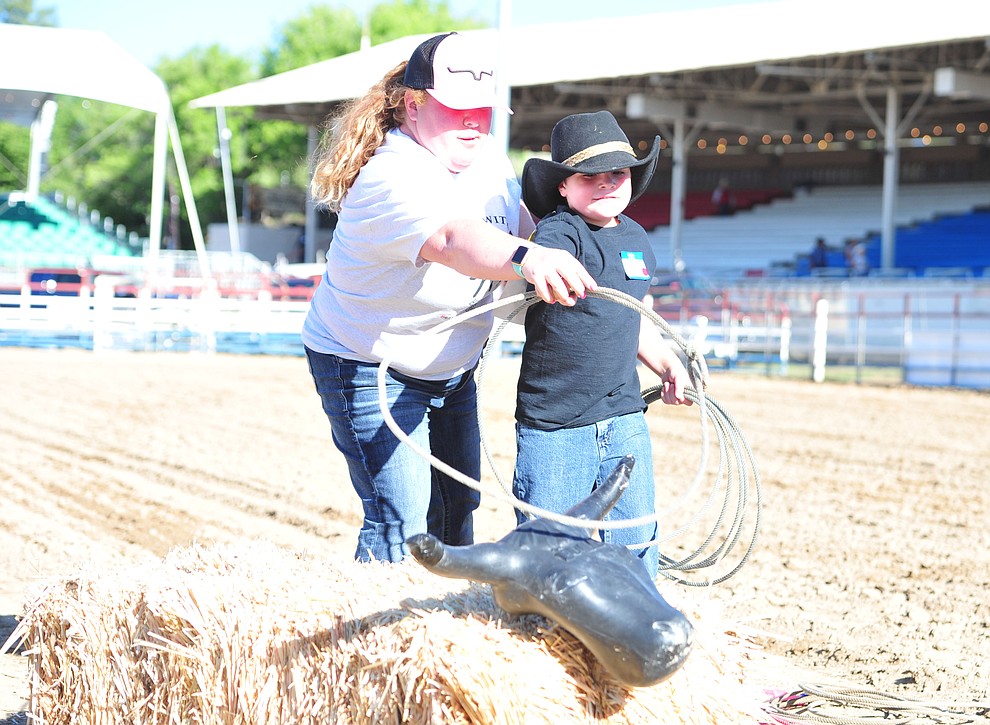 Jackson Hull steer ropes during the Happy Hearts Rodeo for exceptional children before the opening performance of the Prescott Frontier Days Rodeo Thursday, June 28, 2018. (Les Stukenberg/Courier)