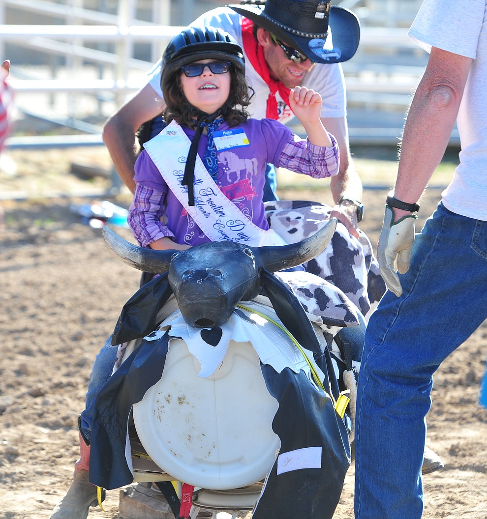 Eliza Kelly shows good bull riding form during the Happy Hearts Rodeo for exceptional children before the opening performance of the Prescott Frontier Days Rodeo Thursday, June 28, 2018. (Les Stukenberg/Courier)