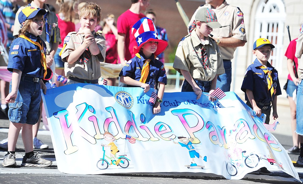 Cub Scouts prepare to lead the 77th annual Kiwanis Kiddie Parade in downtown Prescott Friday, June 29, 2018.(Les Stukenberg/Courier)