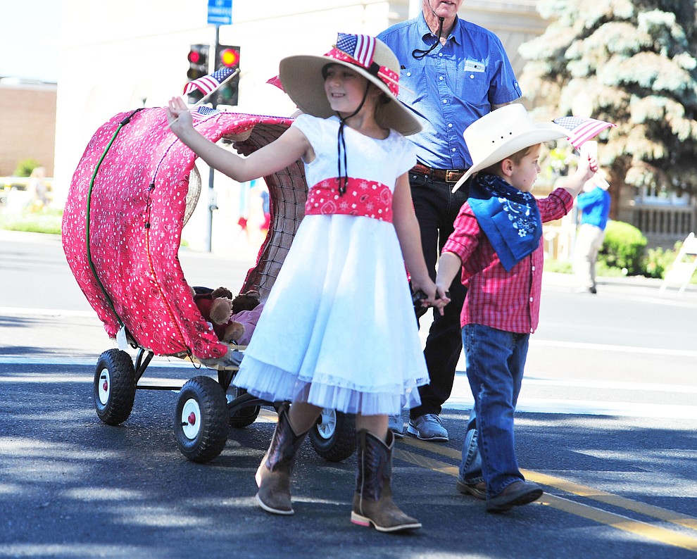 Covered wagons were popular during the 77th annual Kiwanis Kiddie Parade in downtown Prescott Friday, June 29, 2018.(Les Stukenberg/Courier)