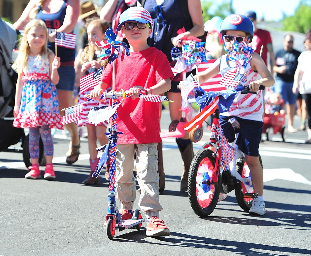 Decorated scooters and bikes are the rage during the 77th annual Kiwanis Kiddie Parade in downtown Prescott Friday, June 29, 2018.(Les Stukenberg/Courier)