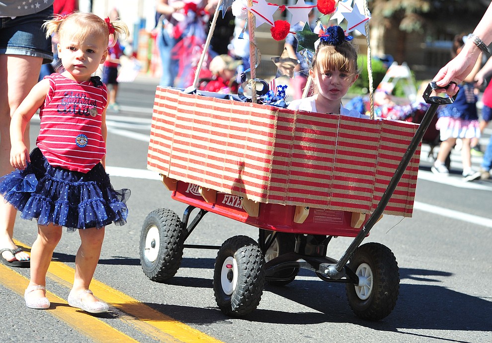 Some children get to ride during the 77th annual Kiwanis Kiddie Parade in downtown Prescott Friday, June 29, 2018.(Les Stukenberg/Courier)