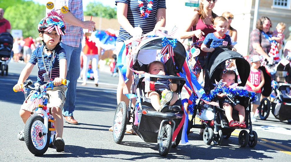 No one is too young to participate in the 77th annual Kiwanis Kiddie Parade in downtown Prescott Friday, June 29, 2018.(Les Stukenberg/Courier)