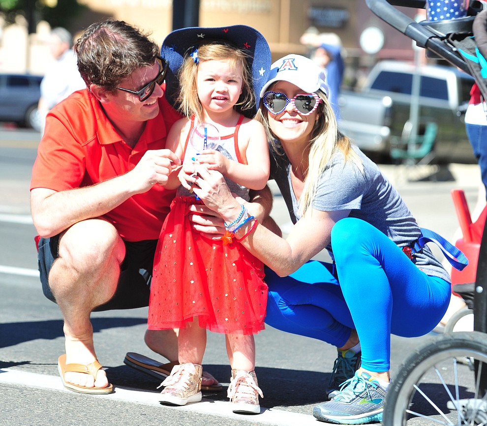 Family's are all smiles during the 77th annual Kiwanis Kiddie Parade in downtown Prescott Friday, June 29, 2018.(Les Stukenberg/Courier)