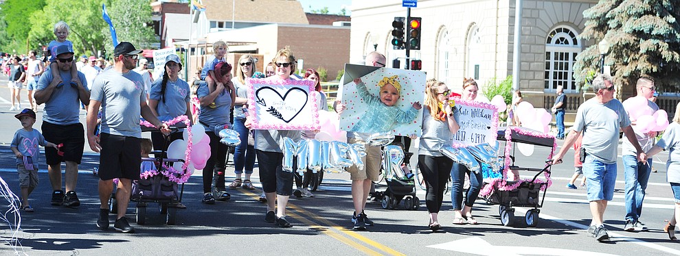 Riley Millikan had about 40 supporters march in the 77th annual Kiwanis Kiddie Parade in downtown Prescott Friday, June 29, 2018. Riley, 8 months, passed away June 19 and would have been a 5th generation to participate in the annual parade. (Les Stukenberg/Courier)