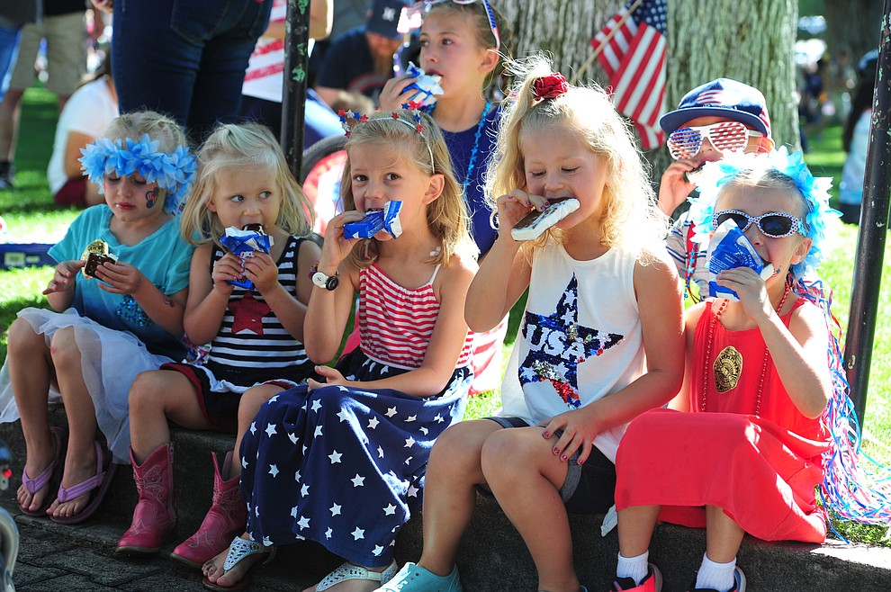 What's better than a morning ice cream sandwich with friends following the 77th annual Kiwanis Kiddie Parade in downtown Prescott Friday, June 29, 2018.(Les Stukenberg/Courier)