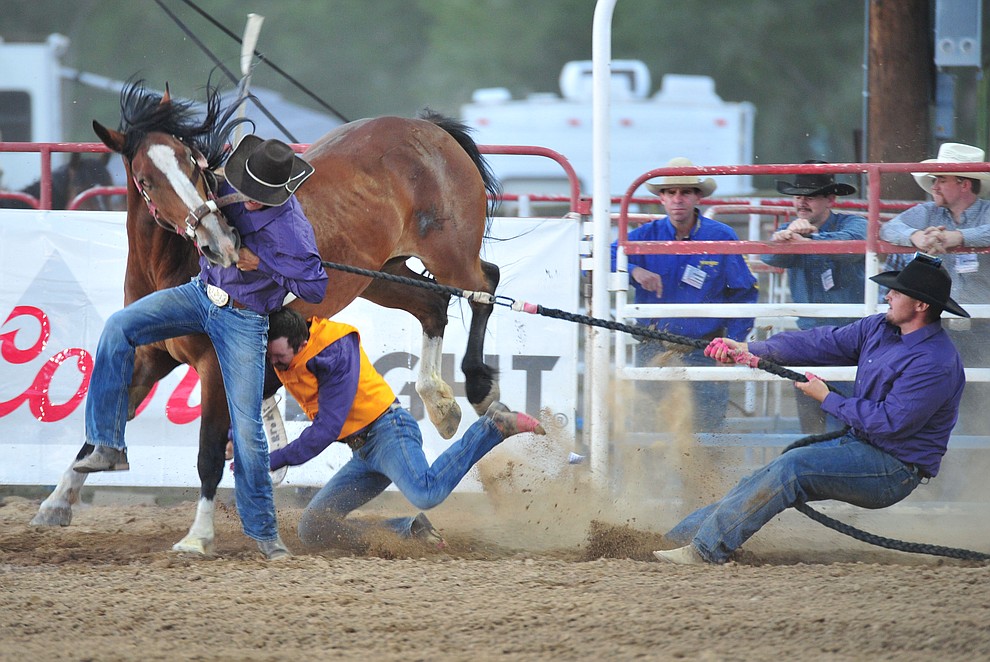 Wild horse racing action during the opening performance of the Prescott Frontier Days Rodeo Thursday, June 28, 2018. (Les Stukenberg/Courier)