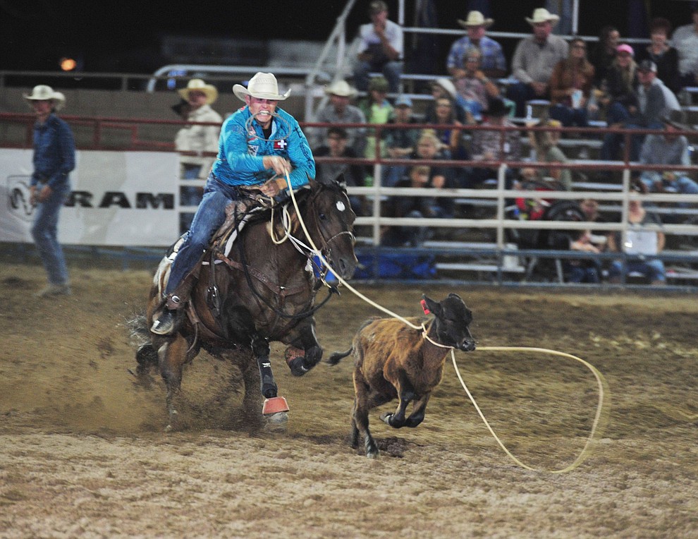 Tuf Cooper ropes his calf in the tie down roping during the opening performance of the Prescott Frontier Days Rodeo Thursday, June 28, 2018. (Les Stukenberg/Courier)