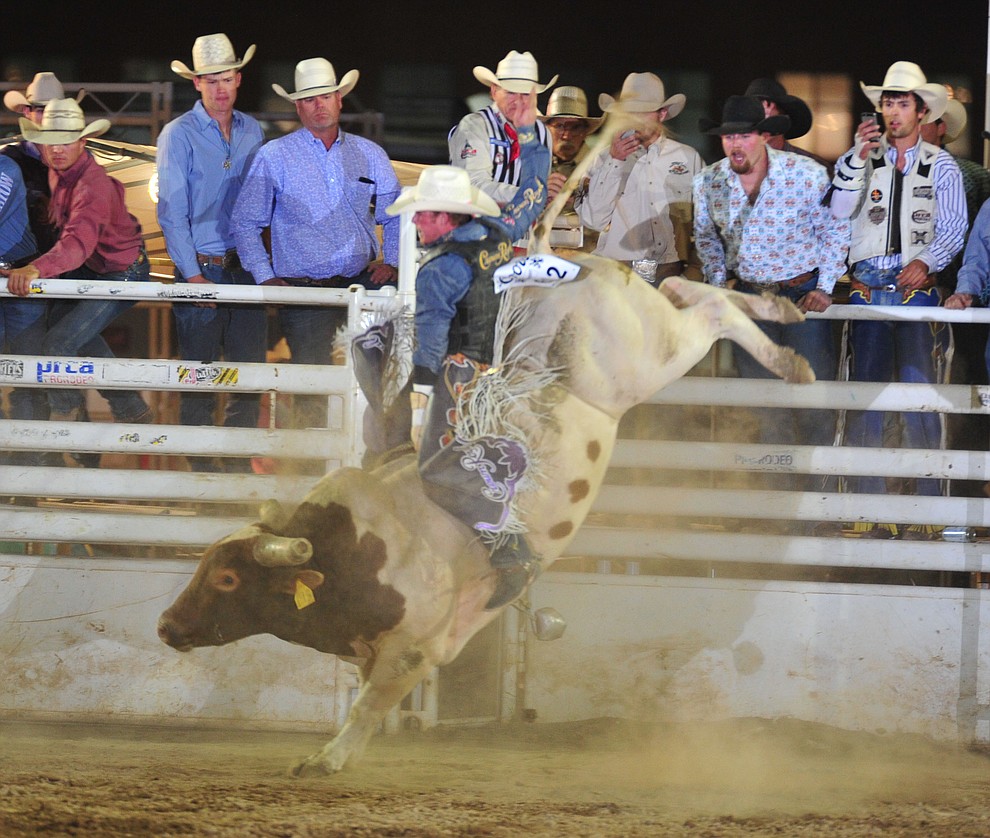 Steve Woolsey in the bull riding during the opening performance of the Prescott Frontier Days Rodeo Thursday, June 28, 2018. (Les Stukenberg/Courier)