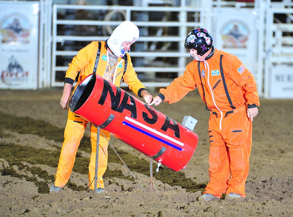 Luke Kraut and Robbie Hodges perform an act during the second performance of the Prescott Frontier Days Rodeo Friday, June 29, 2018.(Les Stukenberg/Courier)