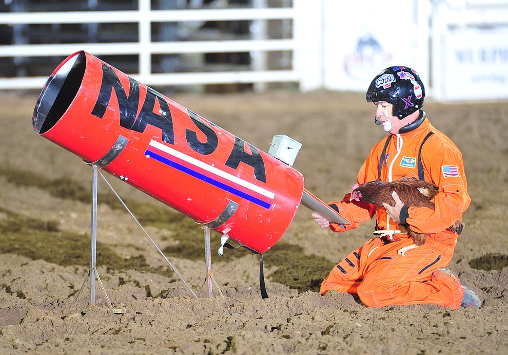 Robbie Hodges performs an act during the second performance of the Prescott Frontier Days Rodeo Friday, June 29, 2018.(Les Stukenberg/Courier)