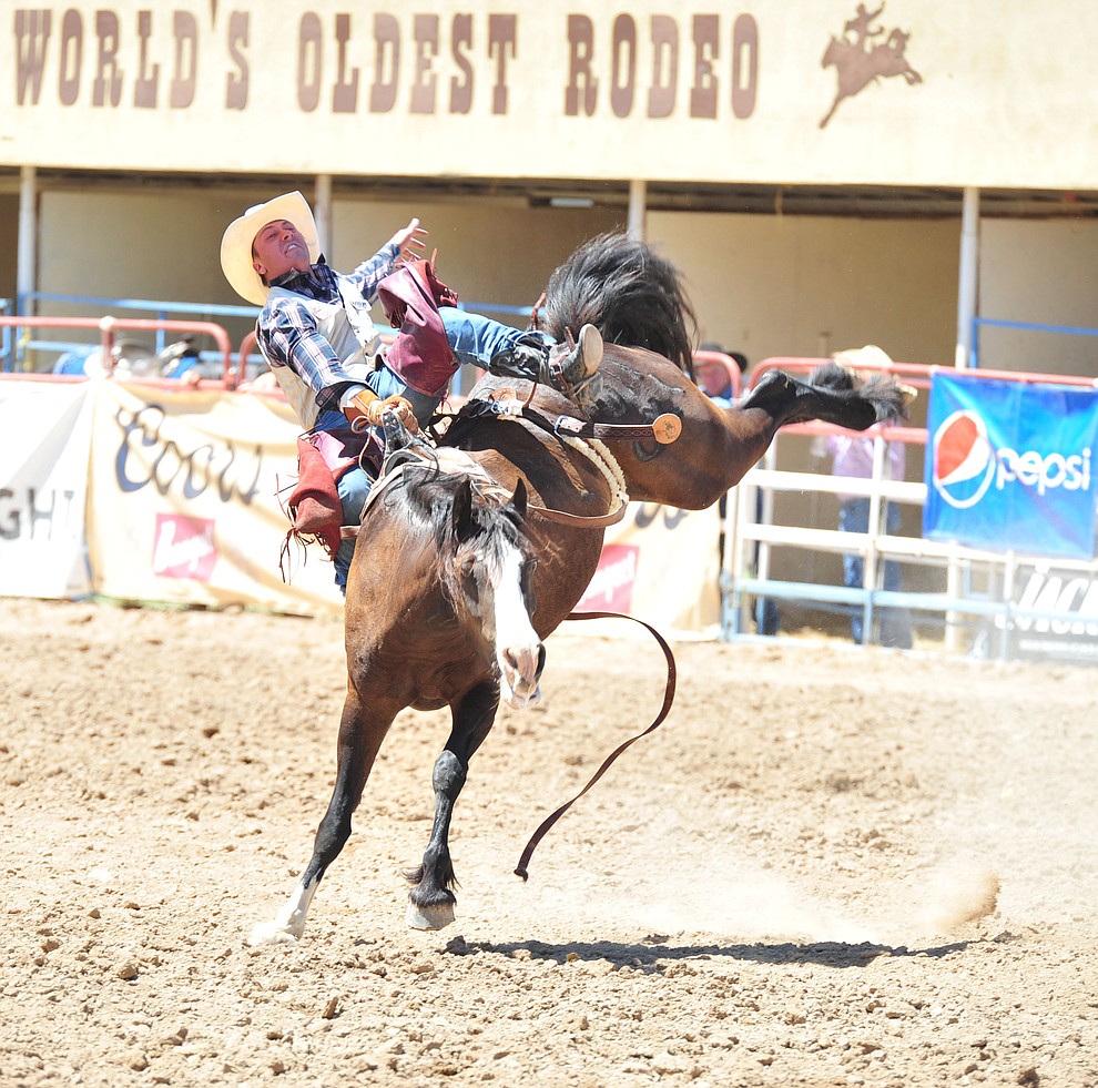 Nate McFadden on Butterfly in the bareback during the third performance of the Prescott Frontier Days Rodeo Saturday, June 30, 2018.(Les Stukenberg/Courier)