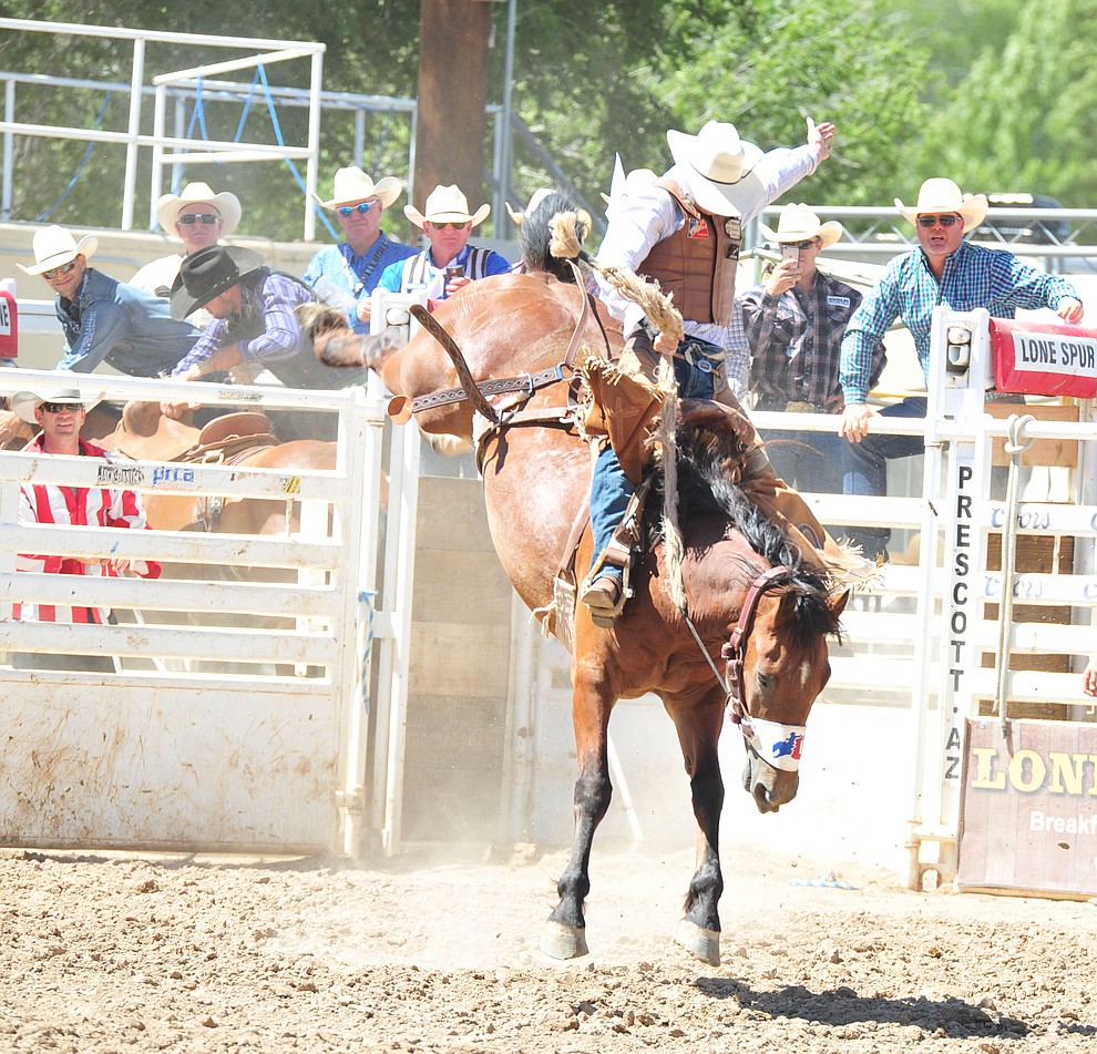 Treyson Antonick scores 76.5 on Mustachio in the saddle bronc riding during the third performance of the Prescott Frontier Days Rodeo Saturday, June 30, 2018.(Les Stukenberg/Courier)