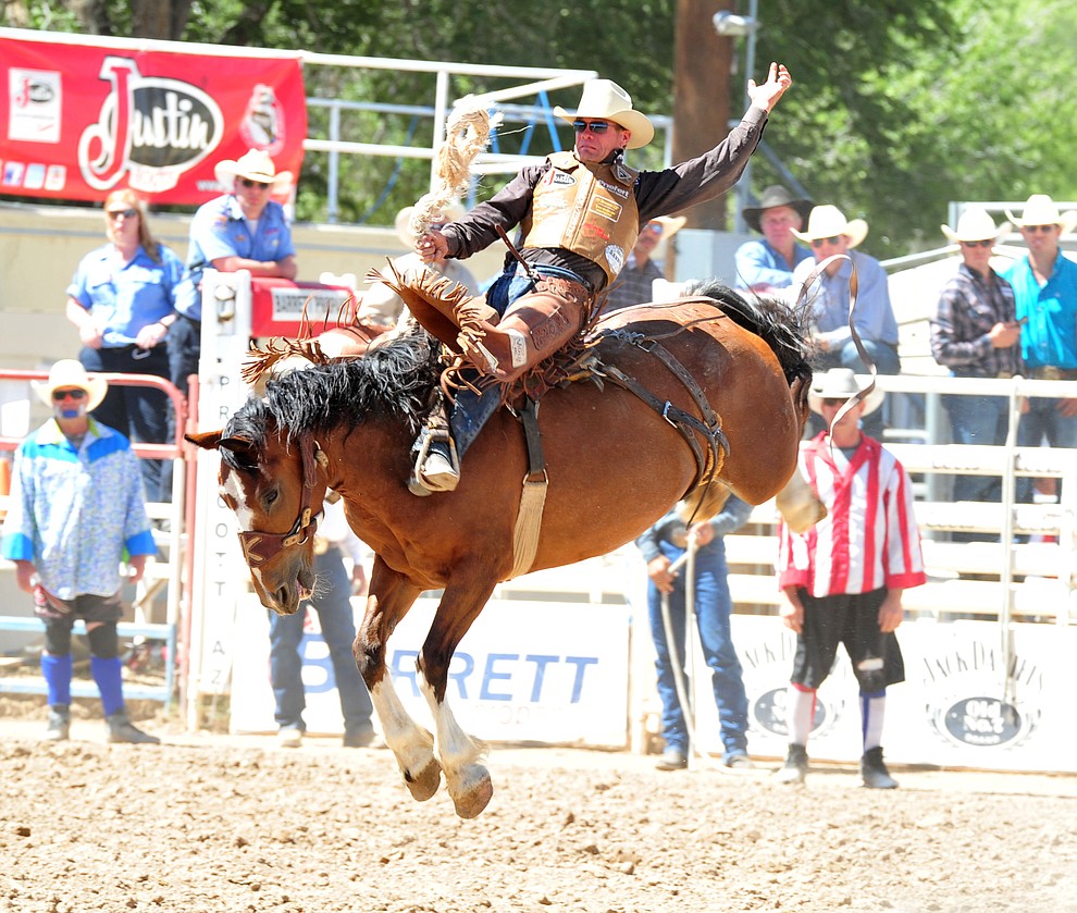Cody DeMoss scores 84.5 on North Side in the saddle bronc riding during the third performance of the Prescott Frontier Days Rodeo Saturday, June 30, 2018.(Les Stukenberg/Courier)