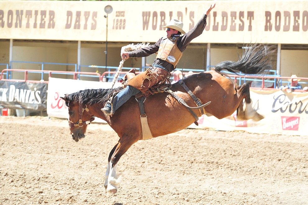 Cody DeMoss scores 84.5 on North Side in the saddle bronc riding during the third performance of the Prescott Frontier Days Rodeo Saturday, June 30, 2018.(Les Stukenberg/Courier)